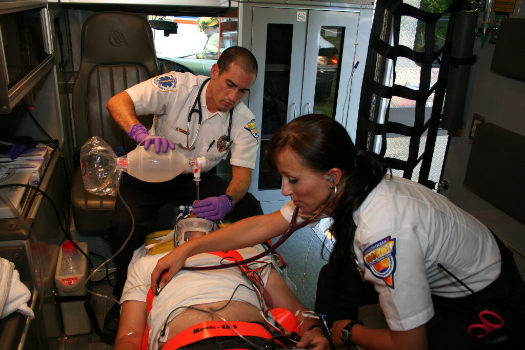 ALS ambulance staffing agency team attending to a patient